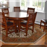 F02. Stickley Furniture Mission style cherry pedestal dining table with 6 chairs and 2 leaves. 52.5”w 